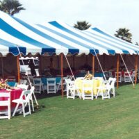 30' x 60' blue and white striped pole tent.