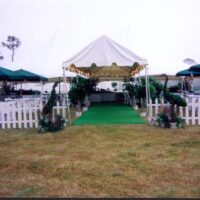 9' wide marquee tent used as an entrance to a picnic.