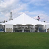 60' x 60' pole tent with clear sidewalls and air conditioning.