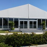 20m x 15m tent with glass walls.